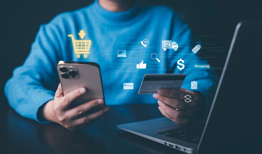 Ein aussagekräftiges Bild, das modernes Online-Shopping zeigt – vom Smartphone über die Kreditkarte bis hin zu digitalen Einkaufssymbolen.