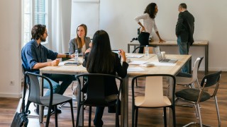 Business people having a team meeting in office